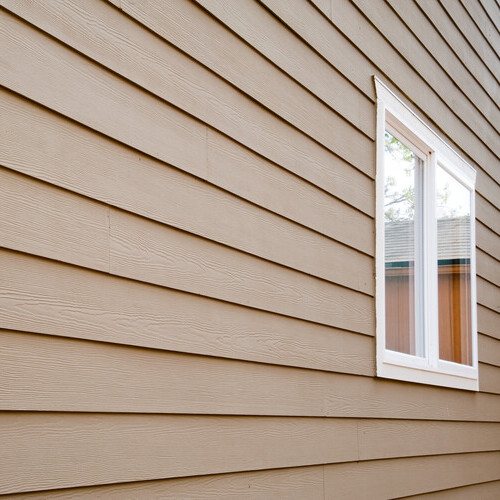 beige siding along the side of a house