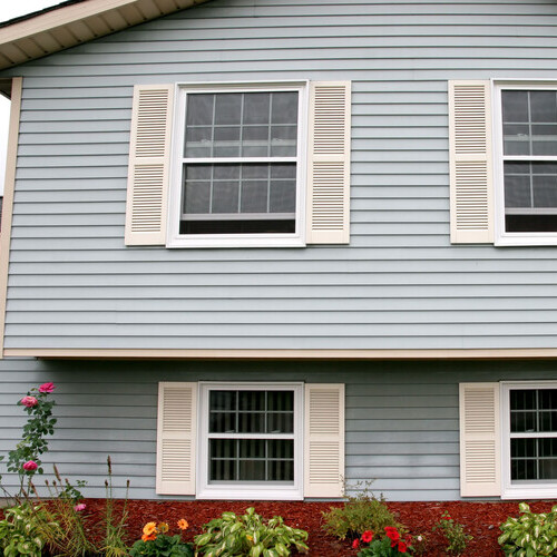 blue vinyl siding on a house
